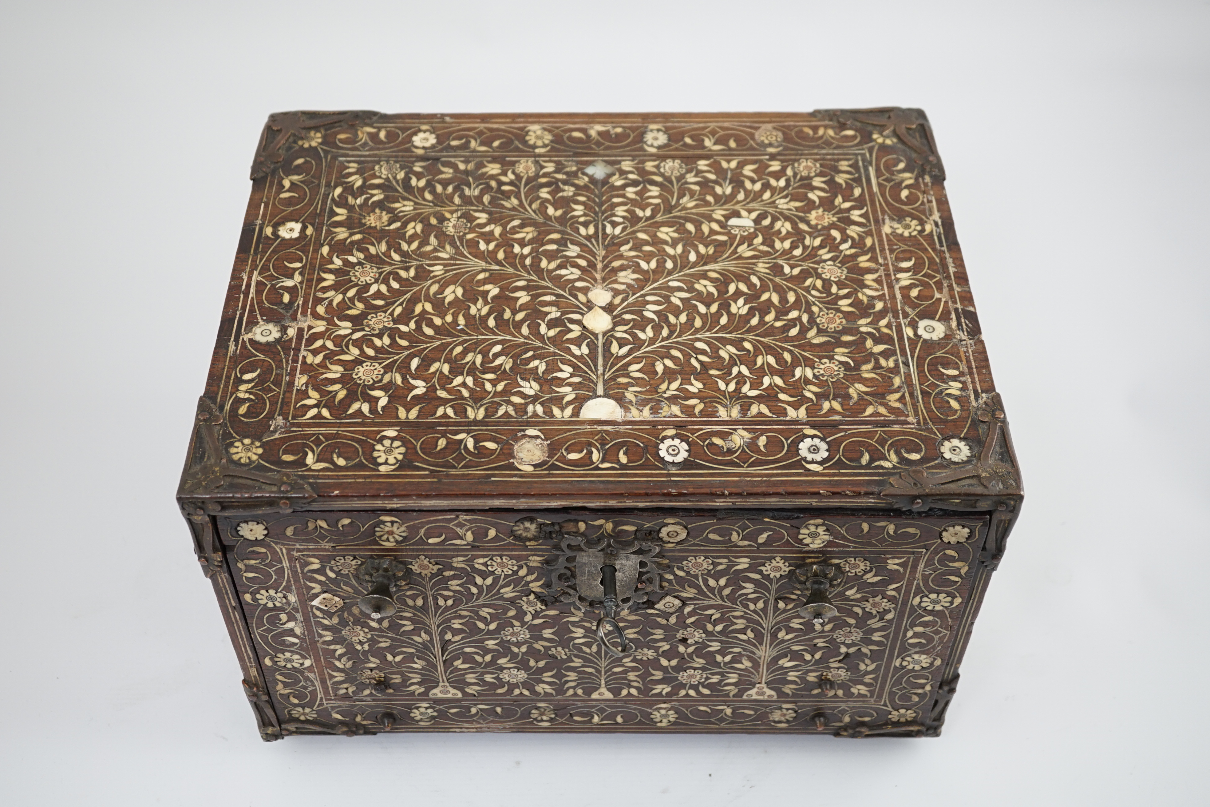 An early 17th century Indo-Portuguese ivory inset hardwood travelling chest